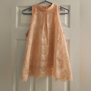 What a romantic and classy top. Two pearl button neck closure. Scalloped